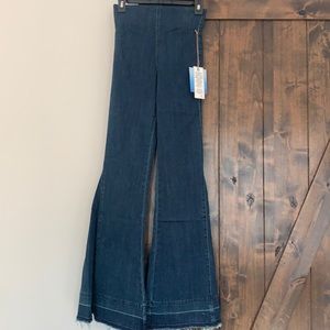 Show me your mumu flare jeans. Never worn!!